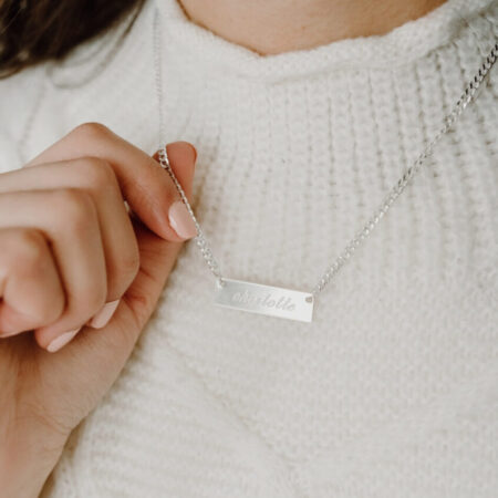 Image of model wearing Engraved Sterling Silver Name Bar Necklace