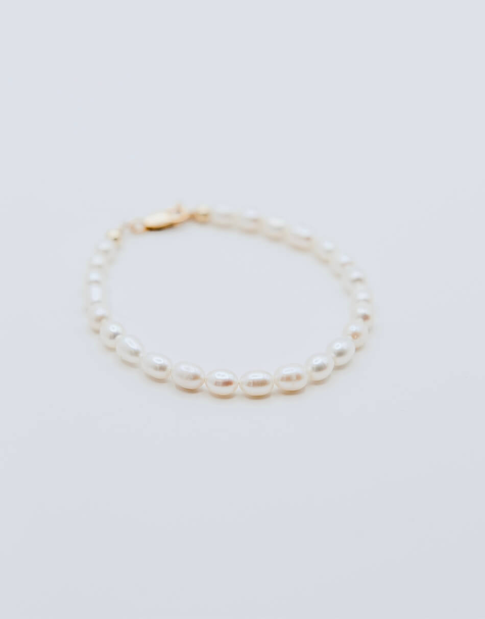 Flat lay image of Gold Filled Rice Pearl Bracelet