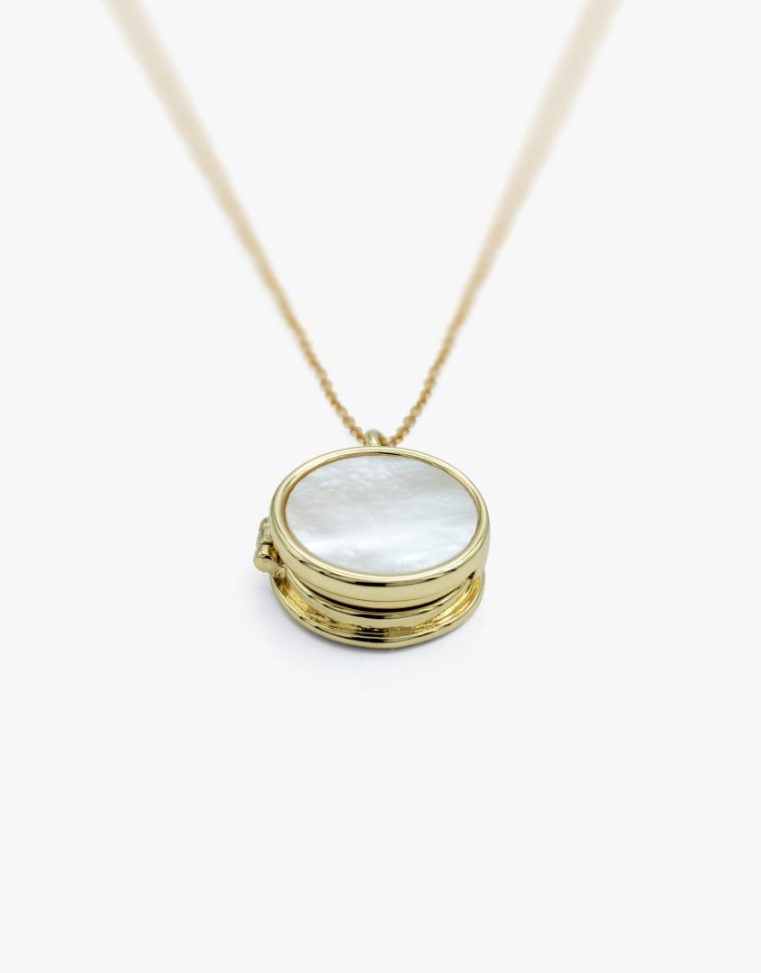 Mother of Pearl locket flat lay