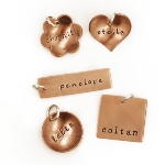 Add a beautiful copper charm to your existing necklace. Each piece is hand stamped with a name of your choice