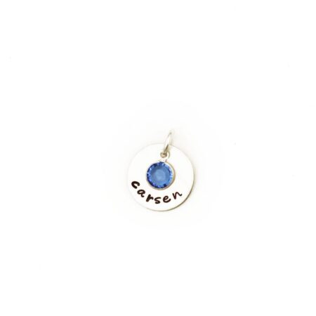 A dainty sterling silver disc with name engraved on it. Add your birthstone in the middle of the disc