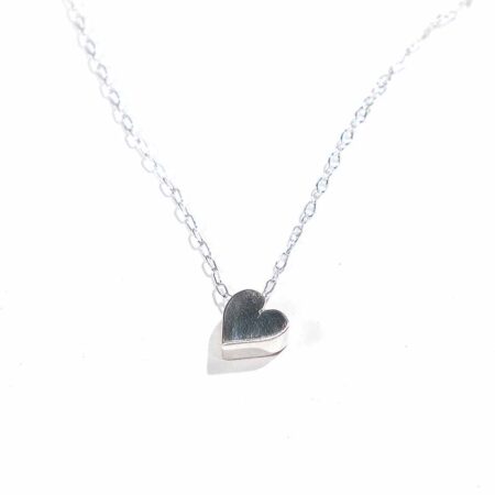Sterling silver heart hung on a beautiful sterling silver dainty chain. Simple yet classy necklace for your loved ones.