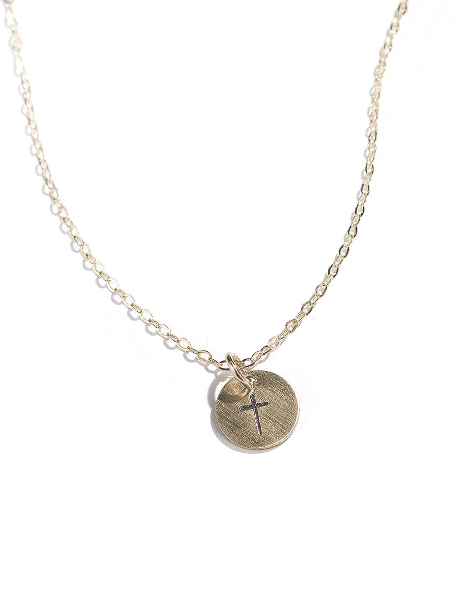 A beautiful dainty faith necklace available in both sterling silver and gold-filled disc. Perfect to give to your wife, daughter, niece.