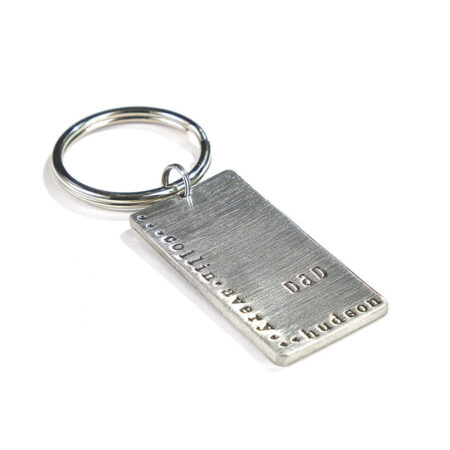 Hand-stamped with special words or names, this keychain is unique. Made in fine pewter and hung on a circle keyring. Best gift for dads or grandpas