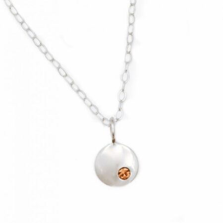 Sterling silver dainty disc necklace embedded with a beautiful birthstone crystal. Perfect gift for mom, wife, sister