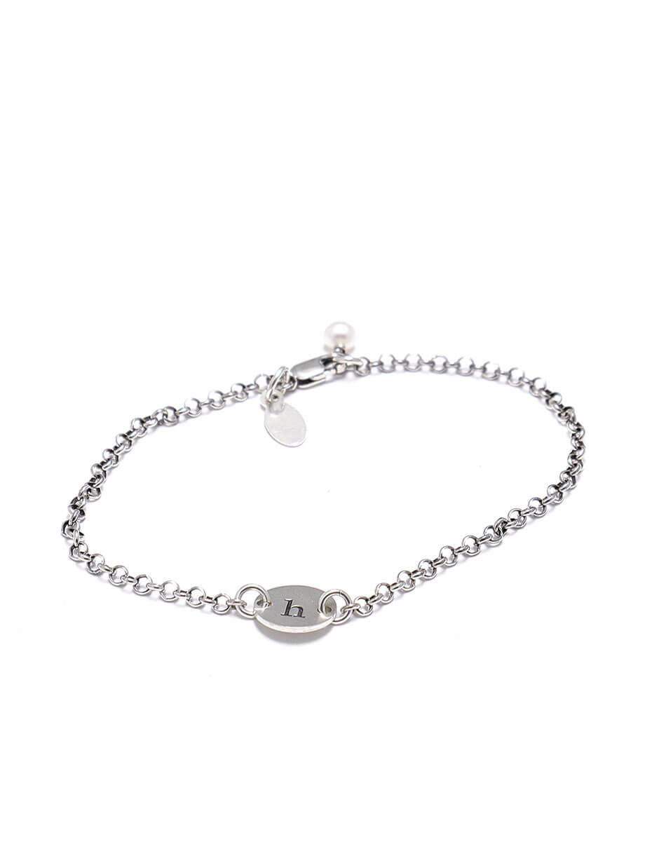 A simple and elegant dainty silver bracelet with initials engraved on it. Perfect gift for mom, sister, friend, daughter