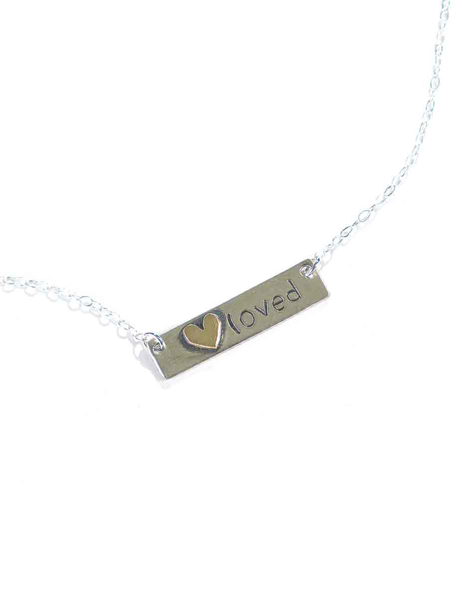 Hand-cut sterling silver rectangle with a sweet gold heart soldered on it. Hung on a beautiful sterling silver dainty chain. Perfect gift for wife