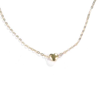 Perfect jewelry for your co-worker, sister-in-law, or best friend. A dainty gold-plated puffy heart hung on a gold-plated chain