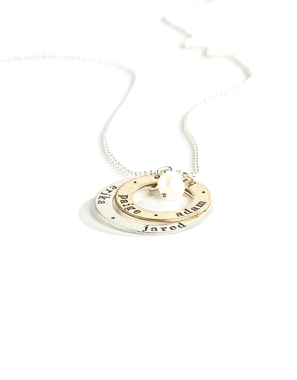 2 hand stamped circles hung on a sterling silver chain. Perfect jewelry gift for mom, grandma, wife
