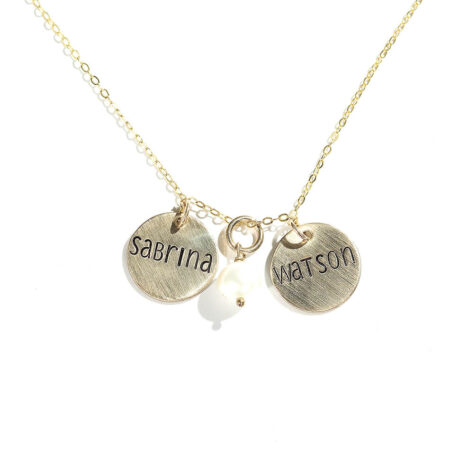 Gold-filled dainty disc with hand stamped name and a freshwater pearl. Perfect gift for wife