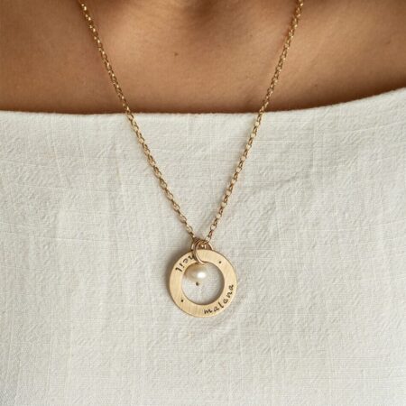 Personalized necklace with hand stamped names or dates on a gold-filled circle of love. Best gift for wife, mom