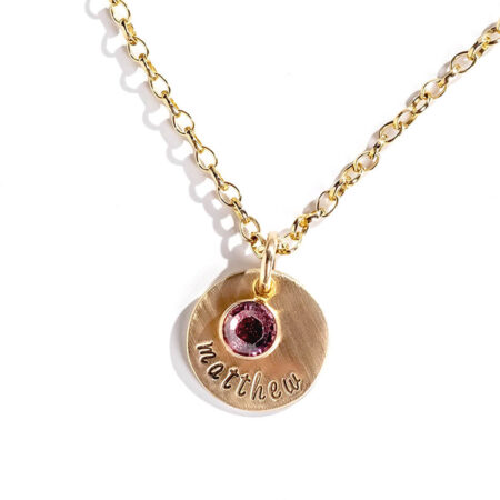 Dainty gold-filled disc with hand stamped name and a Swarovski birthstone crystal. Perfect gift for wife, mom