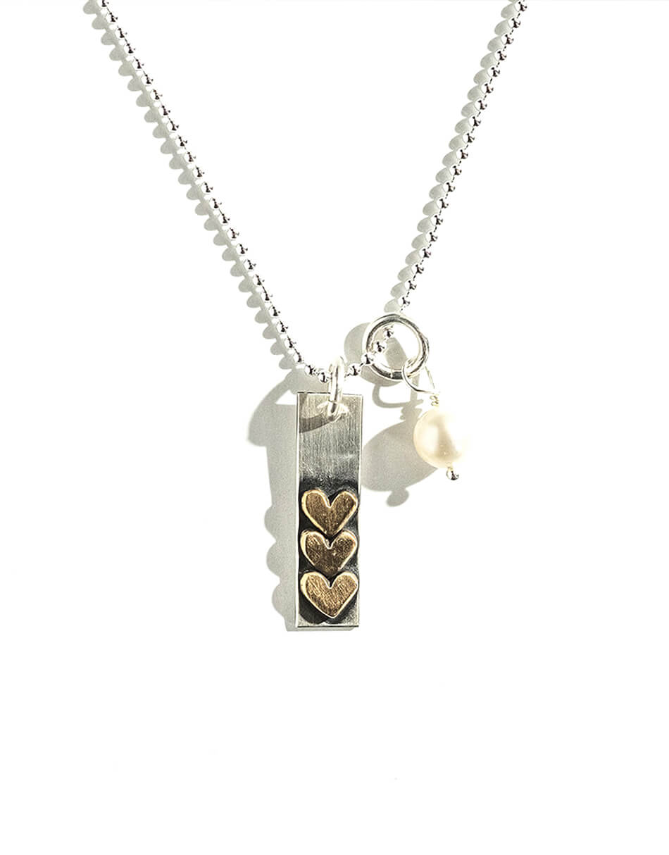 Sterling silver charm stacked with gold-filled hearts, hand-stamped with any word, name, or scripture. Personalized jewelry for mom or grandma