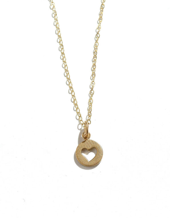 Dainty heart plated in 24k gold and hung on a beautiful gold plated dainty chain. Gorgeous golden necklace for your wife