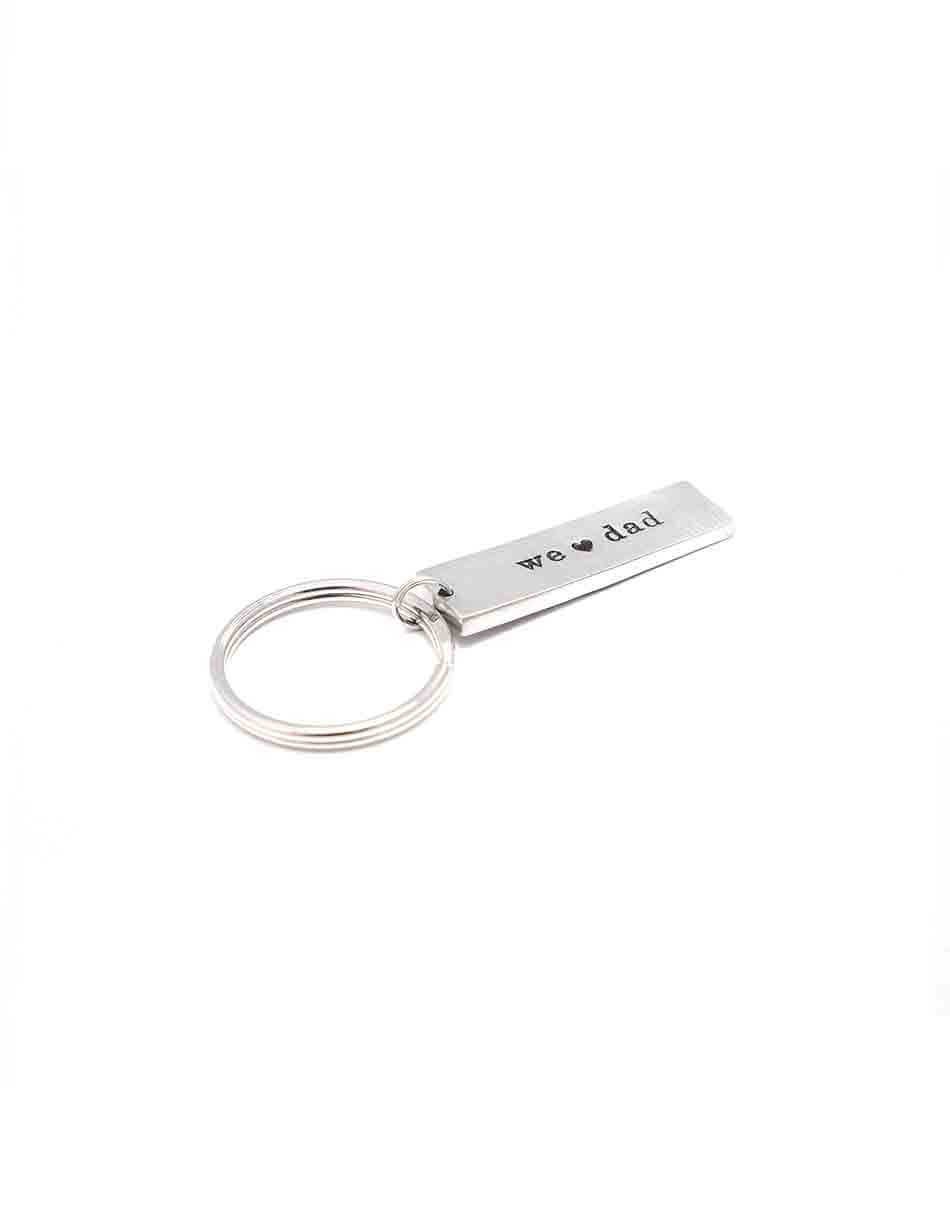 Made in fine pewter and hand-stamped with personalized words, hung on a round keyring. Customize this with I or we heart dad, grandpa, papa, pops.