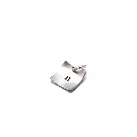 Square sterling silver charm with hand stamped initial. Perfect gift for a girl of any age