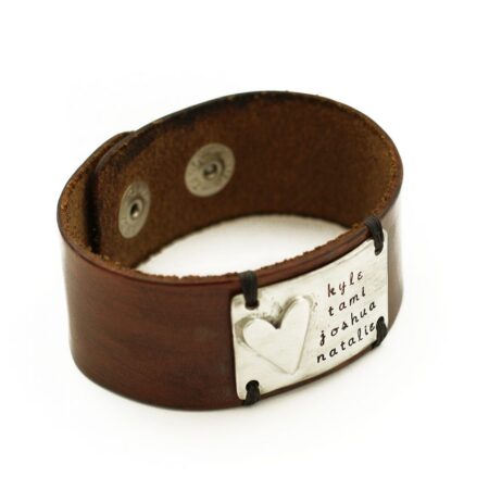 A chunky leather cuff with a handmade pewter charm with message engraved on it. Perfect for husband, dad, brother, son