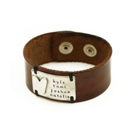 Beautiful chunky charm handmade in fine pewter on brown leather cuffs. Great gift for dad, brother, husband