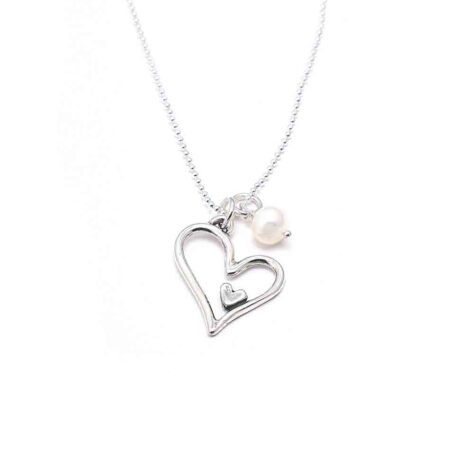 Sterling silver heart charm, hung on a sterling silver ball chain, adorned with a freshwater pearl. Perfect gift for a loved one
