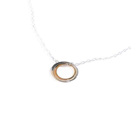 A beautiful sterling silver circle hung beside a gold-filled circle, on a sterling dainty chain. Perfect jewelry for a mother or a daughter