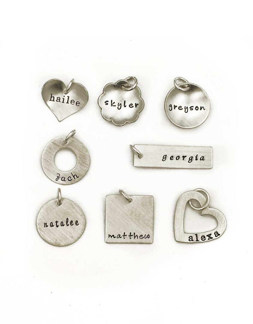 A medium size charm hand stamped with the name on a shape of your choice. Best gift for wife, daughter, friend, sister