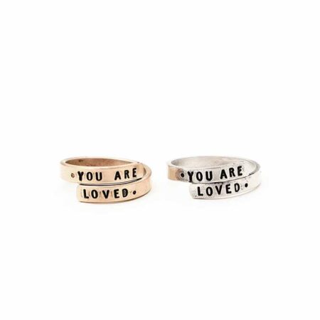A ring that wraps and is handstamped on the ends with a message. Available in sterling silver and gold-filled. Best personalized ring for wife