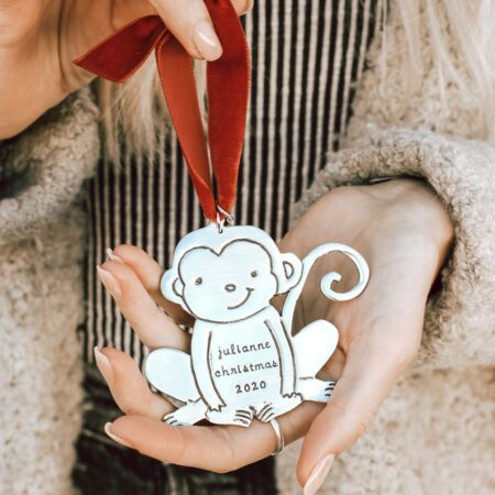 My little monkey ornament is a perfect gift for your kid or your kid's friend. Customize it with the name and the date