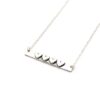 Sterling silver rectangle necklace with hearts representing each family member. Other side is hand stamped with name