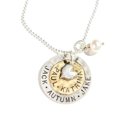 Customized sterling silver disc and the brass disc with names along with a silver heart and a fresh water pearl. Personalized necklace for wife