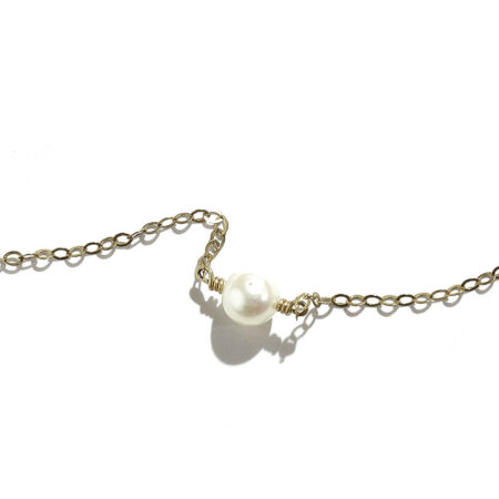 A single freshwater pearl is hung on a gold filled or sterling sliver chain. Beautiful pearl necklace for girls of any age