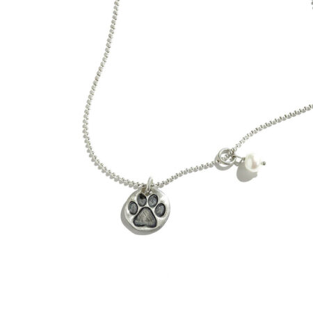 A sweet little paw print in handmade in sterling silver. Perfect gift for dog moms