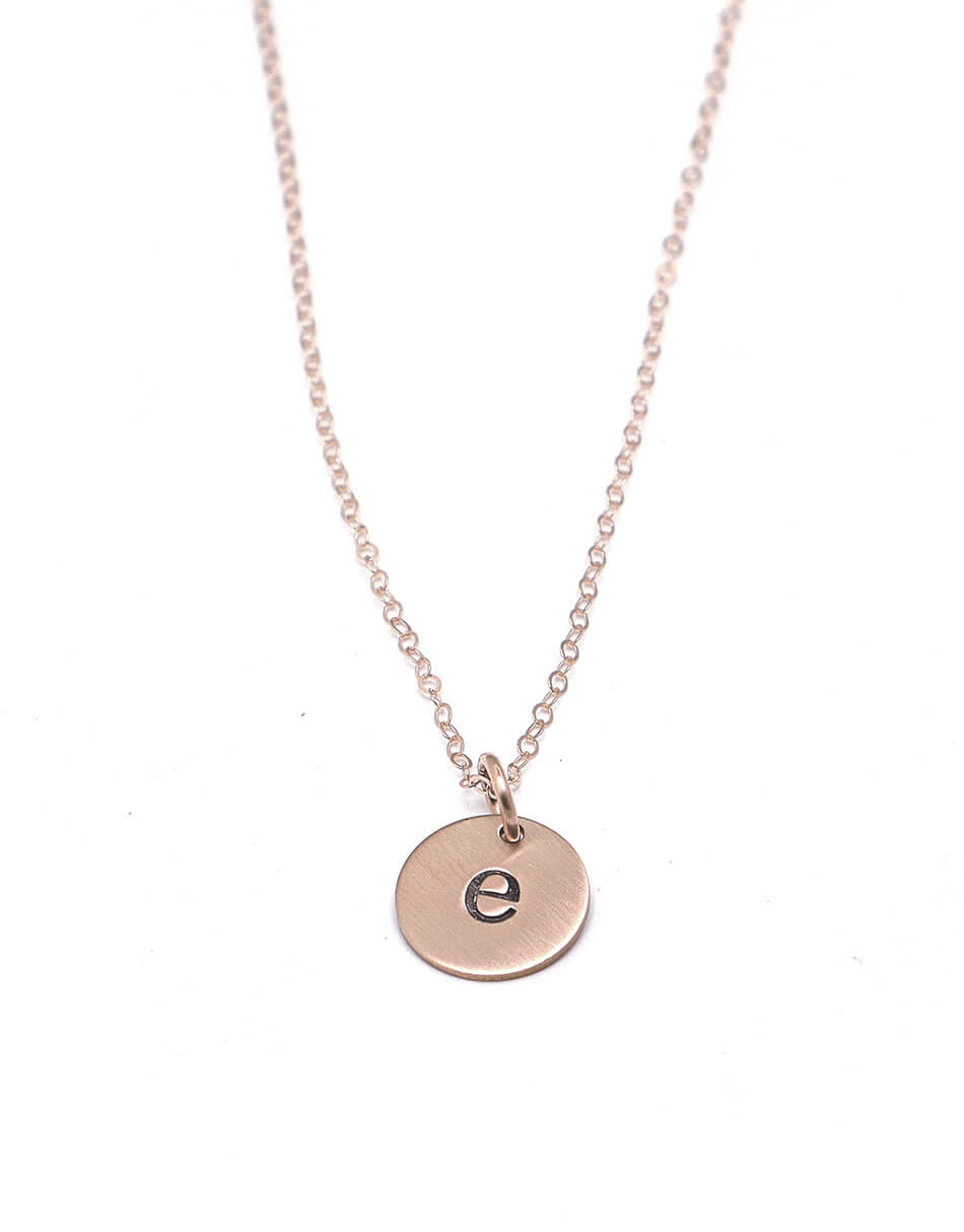 Beautiful dainty rose gold circles necklace with engraved initials. Perfect gift for a new mom, best friend
