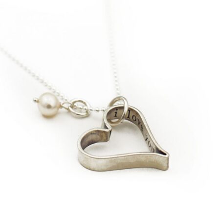 Sterling silver hand forged heart with a special secret message. Perfect gift for wife, mom, daughter