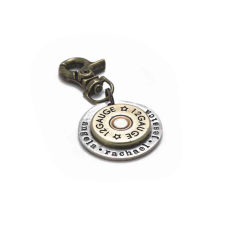 A shotgun shell riveted in the middle of a hand stamped disc. Perfect personalized gift for dad, brother, grandpa