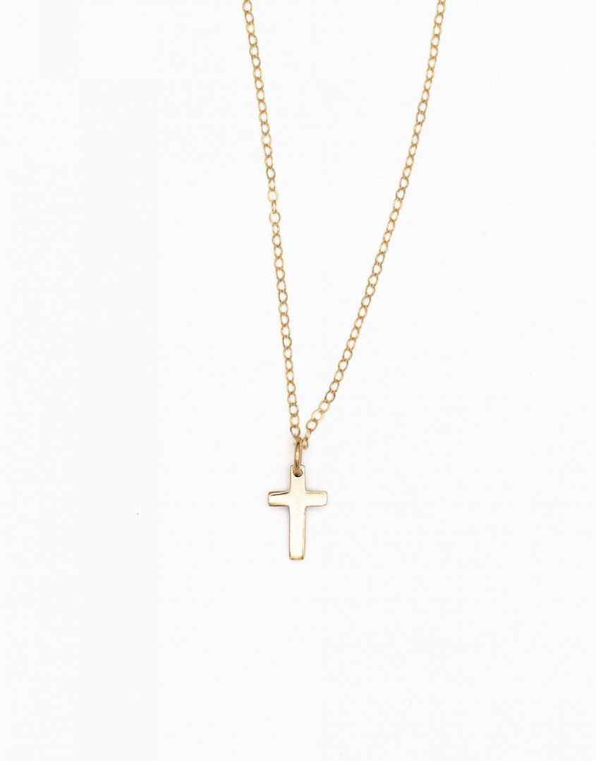 simple-gold-cross-necklace-flat-lay