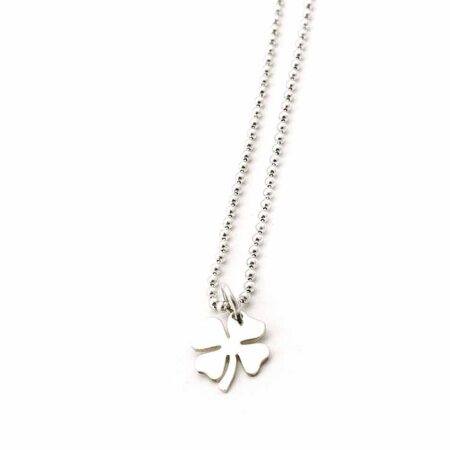 A dainty shamrock charm made in sterling silver, hung on a sterling silver ball chain. Perfect jewelry for girls of any age