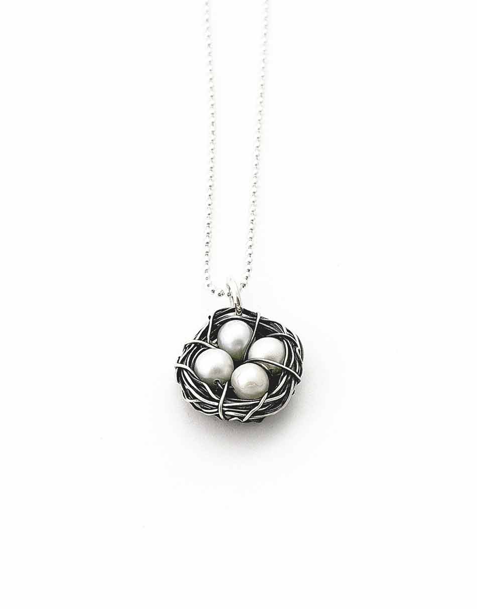 Messy nest pearl necklace. Personalize the necklace by choosing the number of eggs representing your kids.