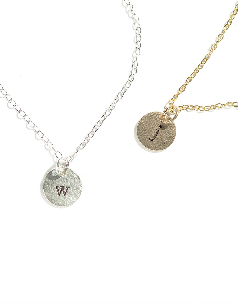 Initial hand-stamped on a tiny sterling silver or gold disc. Best personalized necklace for mom, new mom or wife