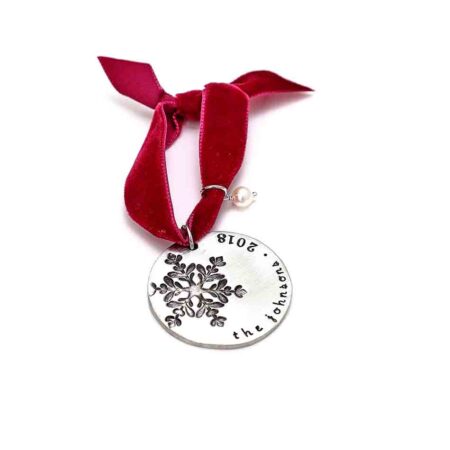 Personalized Christmas gift for a teacher, kid or family. Circle disc is hand stamped with snowflake and a message on the edge