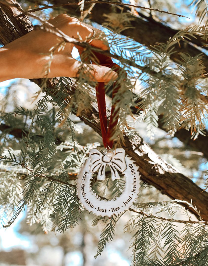 Family wreath ornament is made with quality pewter and topped off with a gorgeous freshwater pearl.